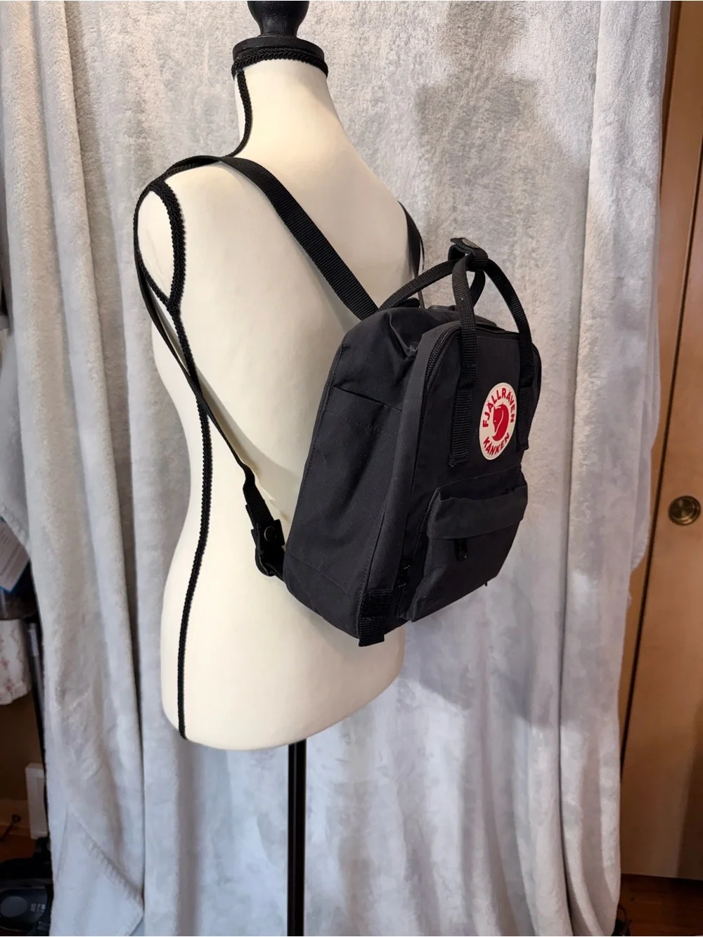 Fjallraven Kanken Mini Backpack in Black with Red Logo